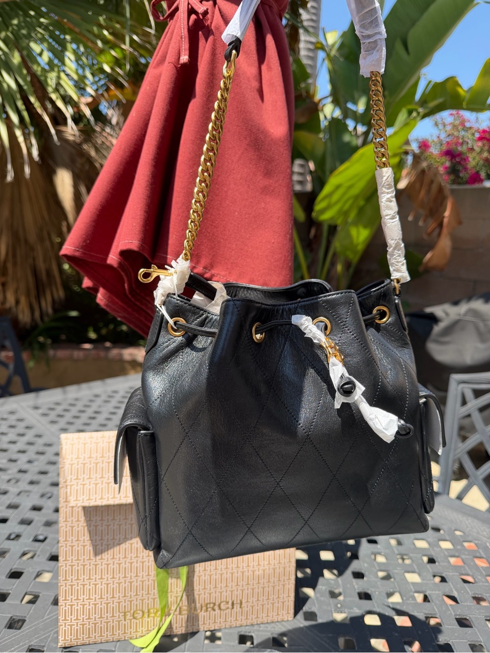 Tory Burch Black Quilted Drawstring Bucket Bag with Gold Chain Strap